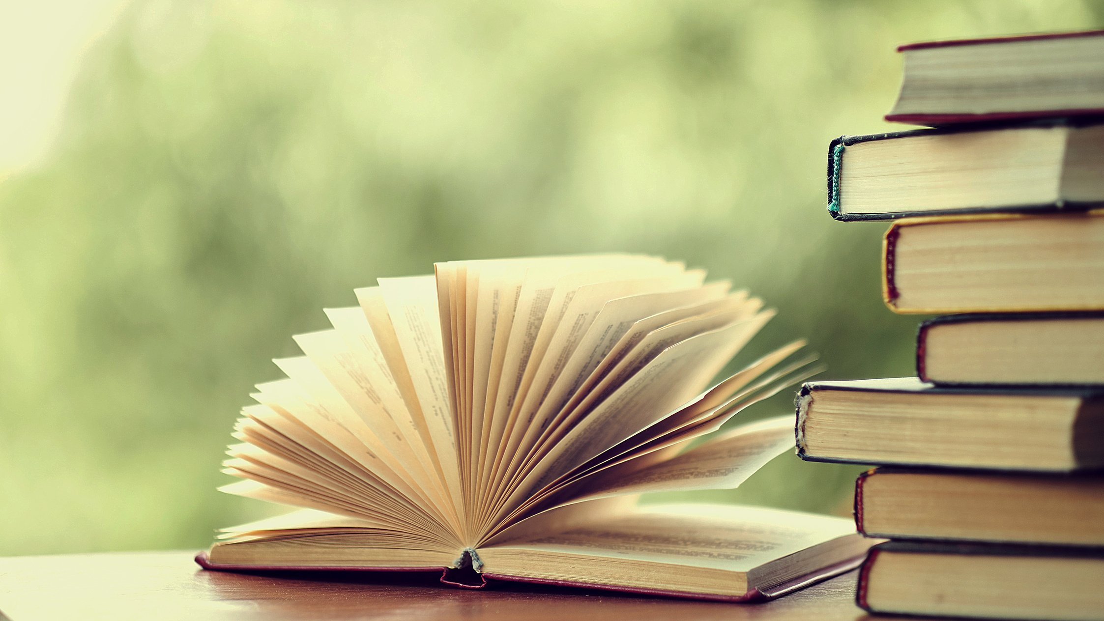 best books home library background. read vintage books in a row. college library table. vintage books publishing